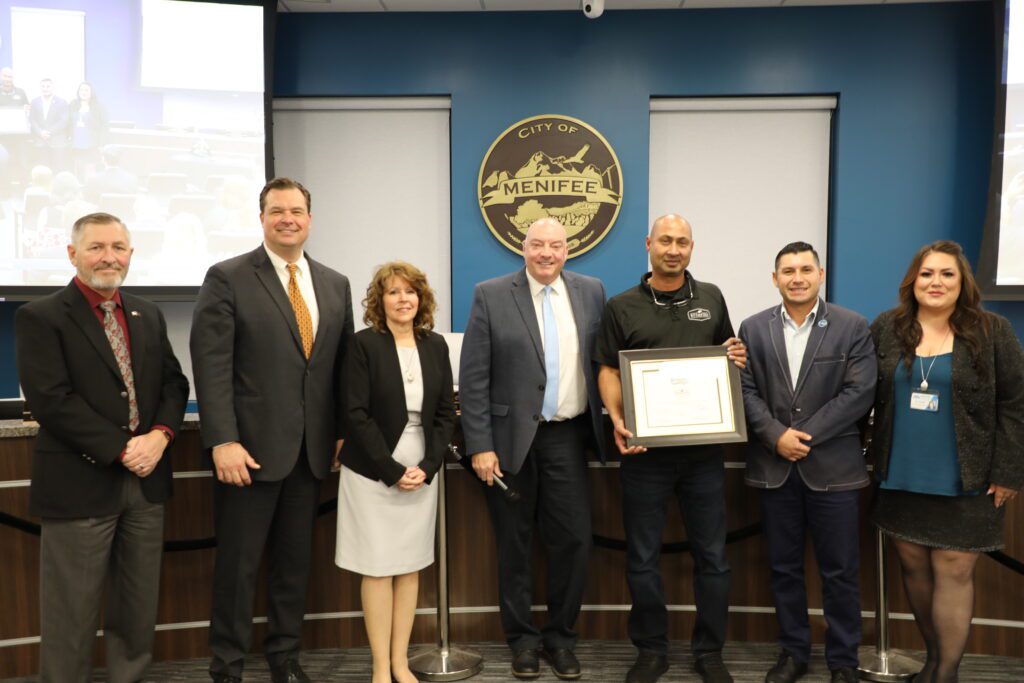 Jude Eranimus, Bushfire's Director of Operations, with Menifee City Council and Economic Development Director Gina Gonzalez